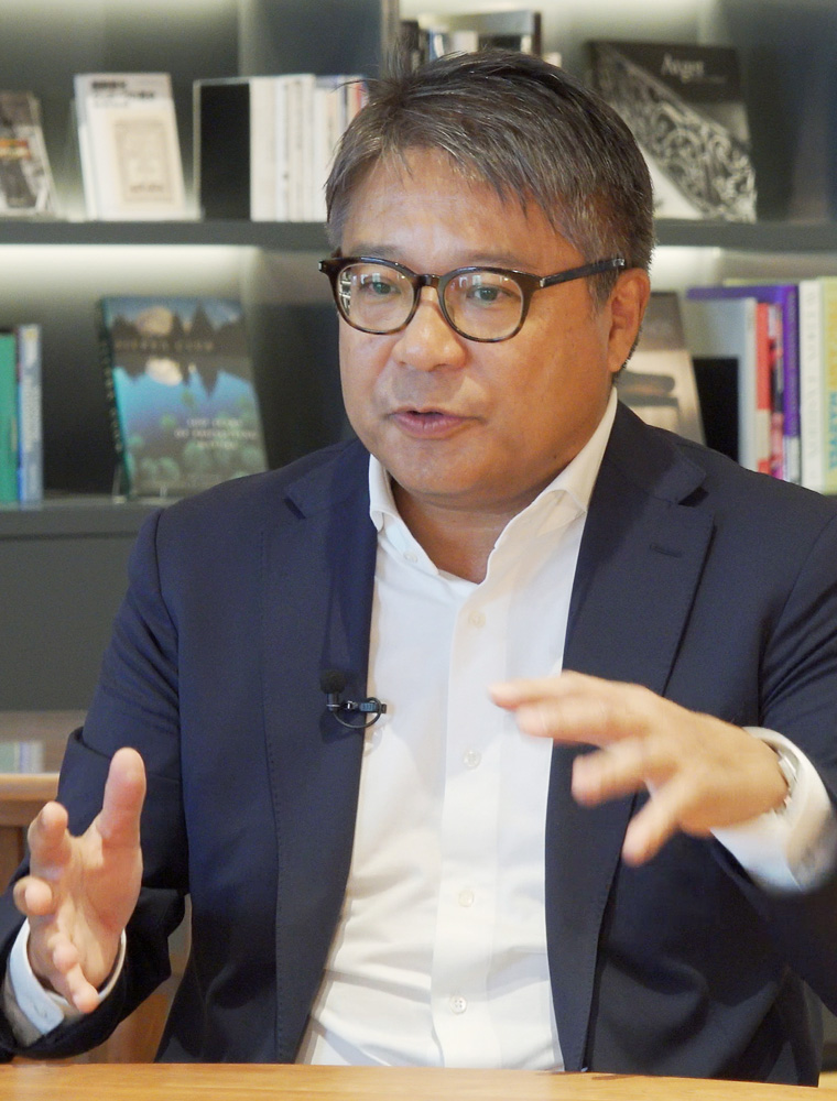 萩野 琢英氏