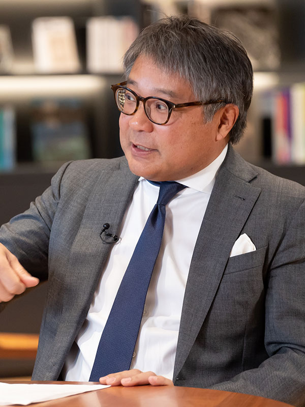 萩野 琢英氏